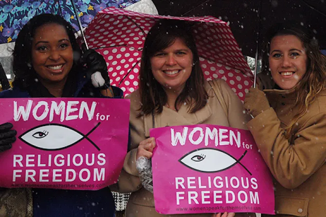 Supporters hold Women for Religious Freedom signs outside of the US Supreme Court building in Washington DC on March 25 2014 Credit Addie Mena CNA CNA 3 25 14