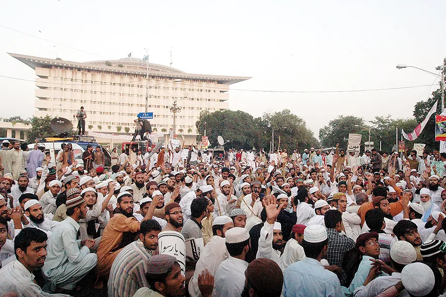Sunni Tehreek supporters protest in favor of Mumtaz Qadri, convicted killer of Salmaan Taseer, during a rally at Mall road in Lahore, Oct. 1, 2011. ?w=200&h=150