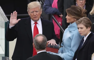 Supreme Court Justice John Roberts (2L) administers the oath of office to U.S. President Donald Trump, Jan. 20, 2017.   Drew Angerer, Getty Images.