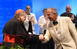 Supreme Knight Carl A. Anderson greets Cardinal Raymond Burke 