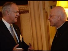 Carl Anderson greets Cardinal Francis George at the financial summit in Chicago. 