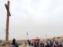 Syrian Catholic Archbishop Youhanna Boutros Moshe of Mosul blesses a newly-erected cross in Bakhdida, Iraq, May 2, 2017. Photo courtesy SOS Chretiens Orient.