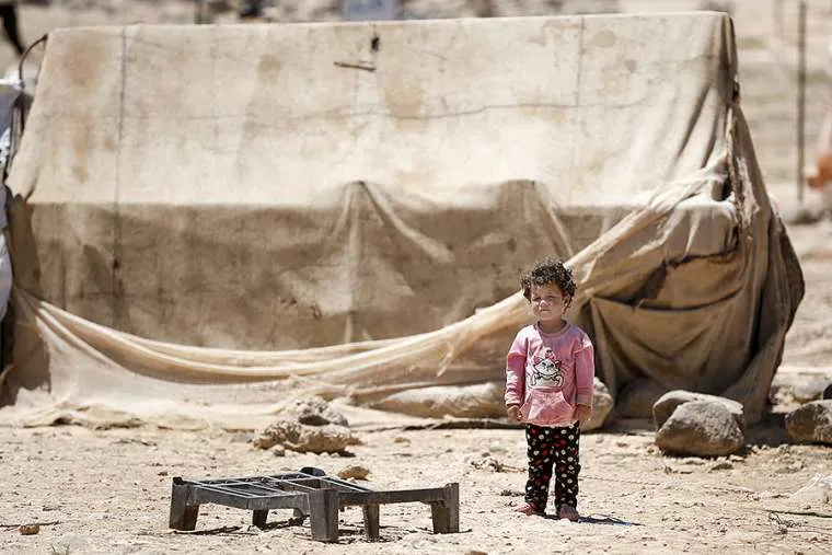 A child in a camp for Syrian refugees. ?w=200&h=150