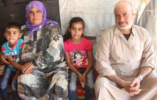 A family of Syrian refugees who have been aided by Catholic Relief Services.   CRS.