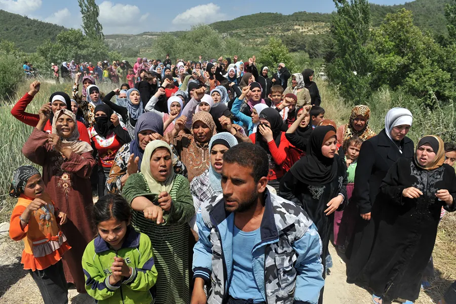 Syrian refugees on the Syria/Turkey border. ?w=200&h=150
