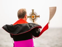 Archbishop Eamon Martin holds a reliquiary containing relics of Auschwitz martyr St. Maximilian Kolbe in Warrenpoint, Northern Ireland, Sept. 5, 2021.