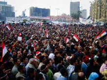 Protestors celebrate in Tahrir Square. 