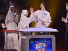 Team Sisters of Mary with Jeff Foxworthy on The American Bible Challenge. Courtesy Grace Hill Media.