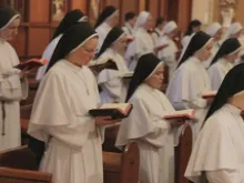 The Dominican Sisters of Mary Mother of the Eucharist sing in choir. 