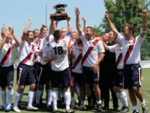  The North American Martyrs celebrate winning the Clericus Cup two years in a row on May 18, 2013. 