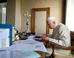 Pope Benedict reads in Castel Gandolfo, near Rome, Italy. Photo by L'Osservatore Romano - Vatican Pool via Getty Images/Getty Images News?w=200&h=150