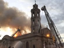 The Shrine of Christ the King Sovereign Priest in flames, Oct. 7, 2015. Photo courtesy of the ICKSP.