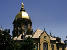 The University of Notre Dame's Main Building, which houses the murals which will soon be "covered by woven material consistent with the décor". 