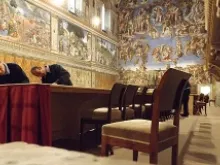 The Vatican's Sistine Chapel is prepared in advance of the conclave March 10, 2013. 