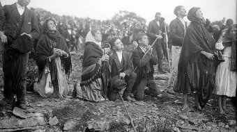 Crowds looking at the Miracle of the Sun, occurring during the Our Lady of Fatima apparitions in 1917.