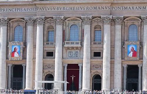 The images of Pope John XXIII and Pope John Paul II hanging from the facade of St. Peter's Basilica at the Vatican April 25, 2014. ?w=200&h=150