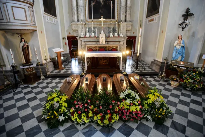 This picture taken March 21 2020 shows coffins on the ground of the church in Serina near Bergamo northern Italy Credit Piero Cruciatti AFP via Getty Images