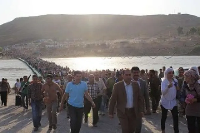 Thousands of Syrians streamed across a bridge over the Tigris River entering Iraq on Thursday August 15 2013 Credit UNHCR GGubaeva CNA 8 20 13