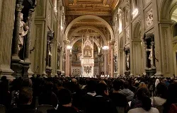 Thousands fill the Basilica of St. John Lateran for the beginning of canonization celebrations, April 22, 2014. ?w=200&h=150