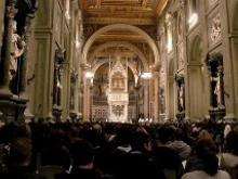Thousands fill the Basilica of St. John Lateran for the beginning of canonization celebrations, April 22, 2014. 