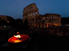 Crowds pray the Stations of the Cross at the Colosseum with Pope Francis on Good Friday 2019. 