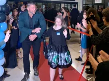 Tim Tebow and a guest at Rome's Night to Shine, Feb. 4. 2020. 