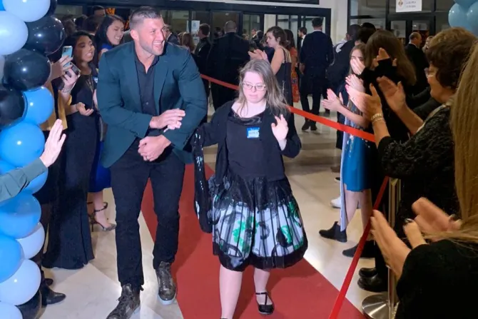 Tim Tebow and a guest at Romes Night to Shine Feb 4 2020 Credit Courtney Mares CNA