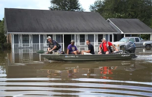 Record-breaking rains pelted Louisiana over the weekend leaving Baton Rouge with historic levels of flooding that have caused at least seven deaths.   Joe Raedle/Getty Images.