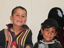 Two boys from Syria are among the thousands of Syrian refugees receiving food and other emergency assistance from Caritas Jordan. 
