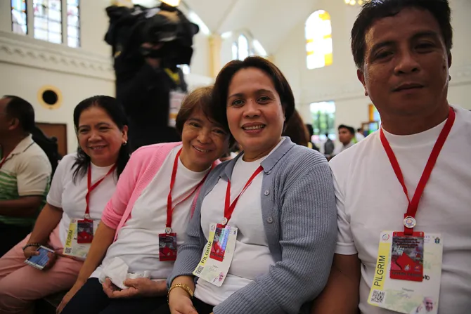 Typhoon Yolanda survivor Elena Garado second from left at the Cathedral of the Transfiguration of Our Lord in Palo Philippines Jan 17 2015 Credit Alan Holdren CNA CNA 1 17 15