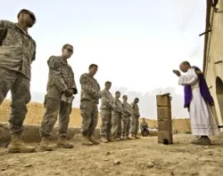 US Army chaplain Fr. Carl Subler says Mass for soldiers in Badula Qulp, Helmand province, Afghanistan, Feb. 21, 2010. USAF photo by Tech. Sgt Efren Lopez.?w=200&h=150