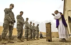 U.S. Army chaplain Fr. Carl Subler celebrates Mass for soldiers in Badula Qulp in Helmand province, Afghanistan, Feb. 21, 2010. ?w=200&h=150