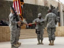 US military holds flag casing ceremony in Baghdad as troops pullout of country. 