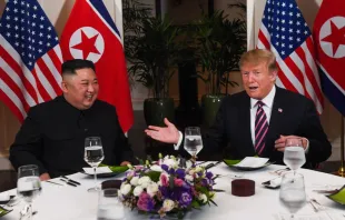 US President Donald Trump (R) and North Korea's leader Kim Jong Un sit for a dinner at the Sofitel Legend Metropole hotel in Hanoi, Feb. 27, 2019.   Saul Loeb/AFP/Getty Images.