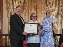 US Secretary of State Michael Pompeo and Presidential advisor Ivanka Trump present a certificate to Sister Gabriella Bottani. State Department photo by Ron Przysucha / Public Domain.