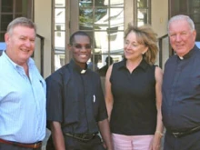 From left are Daniel Marecki; Father Emmanuel Kakaaga Byaruhanga of Rwesigiire, Uganda; Jane Holler; and Father Maurice J. Maroney, Pastor of St. Gabriel Parish in Milford. (Photo by Mary Chalupsky)