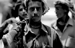 A Yemeni man hold a rifle in Aden, Sept. 14, 2006.   Dmitry Chulov/Shutterstock.