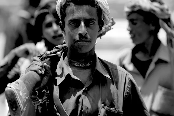 Unidentified young Yemeni man holds a rifle in Aden Yemen Credit Dmitry Chulov Shutterstock CNA