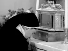 A nun venerates the relics of St. Teresa of Avila in Sofia, Bulgaria. 