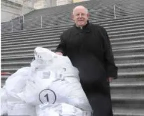 Arlington Bishop Paul S. Loverde brings 189,000 postcards to Capitol Hill protesting the Freedom of Choice Act. / Photo ?w=200&h=150