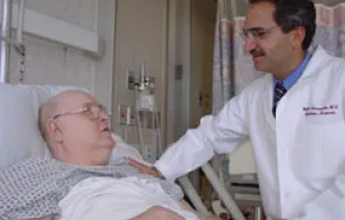 An elderly patient being treated by a doctor at a VA hospital 