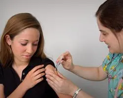 A teenager receives a vaccination. ?w=200&h=150