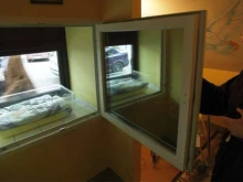 A Franciscan Sister of the Family of Mary in Warsaw shows the "Window of Life". 