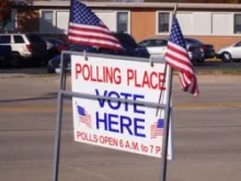 A Vote Here sign. 