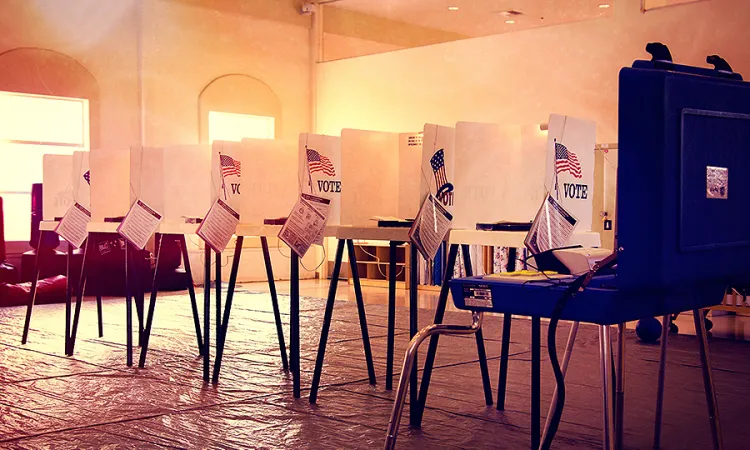 Voting booths Credit Stephen Velasco via Flickr CC BY NC 20 filter added CNA