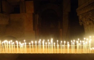 Votive candles in the Church of the Holy Sepulchre in Jerusalem, Israel.   Marianne Medlin/CNA.