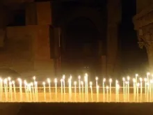 Votive candles in the Church of the Holy Sepulchre in Jerusalem, Israel. 