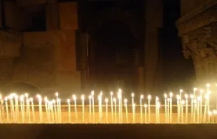    Votive candles in the Church of the Holy Sepulchre in Jerusalem, Israel.   Marianne Medlin/CNA.