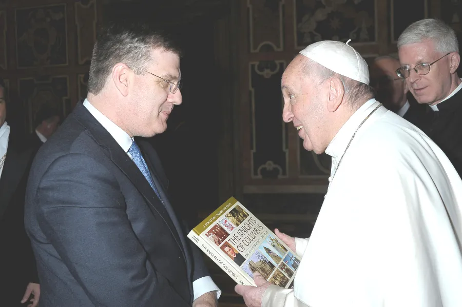 Andrew Walther presents "The Knights of Columbus: An Illustrated History" to Pope Francis. Courtesy photo.?w=200&h=150