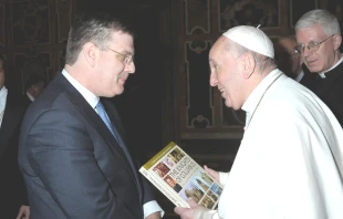 Andrew Walther presents "The Knights of Columbus: An Illustrated History" to Pope Francis. Courtesy photo.